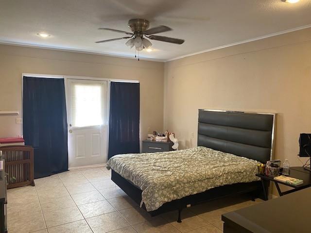 533 East Bryson Avenue Athens, TX 75751 - Photo 6 of 6 a bedroom with a bed and a chandelier