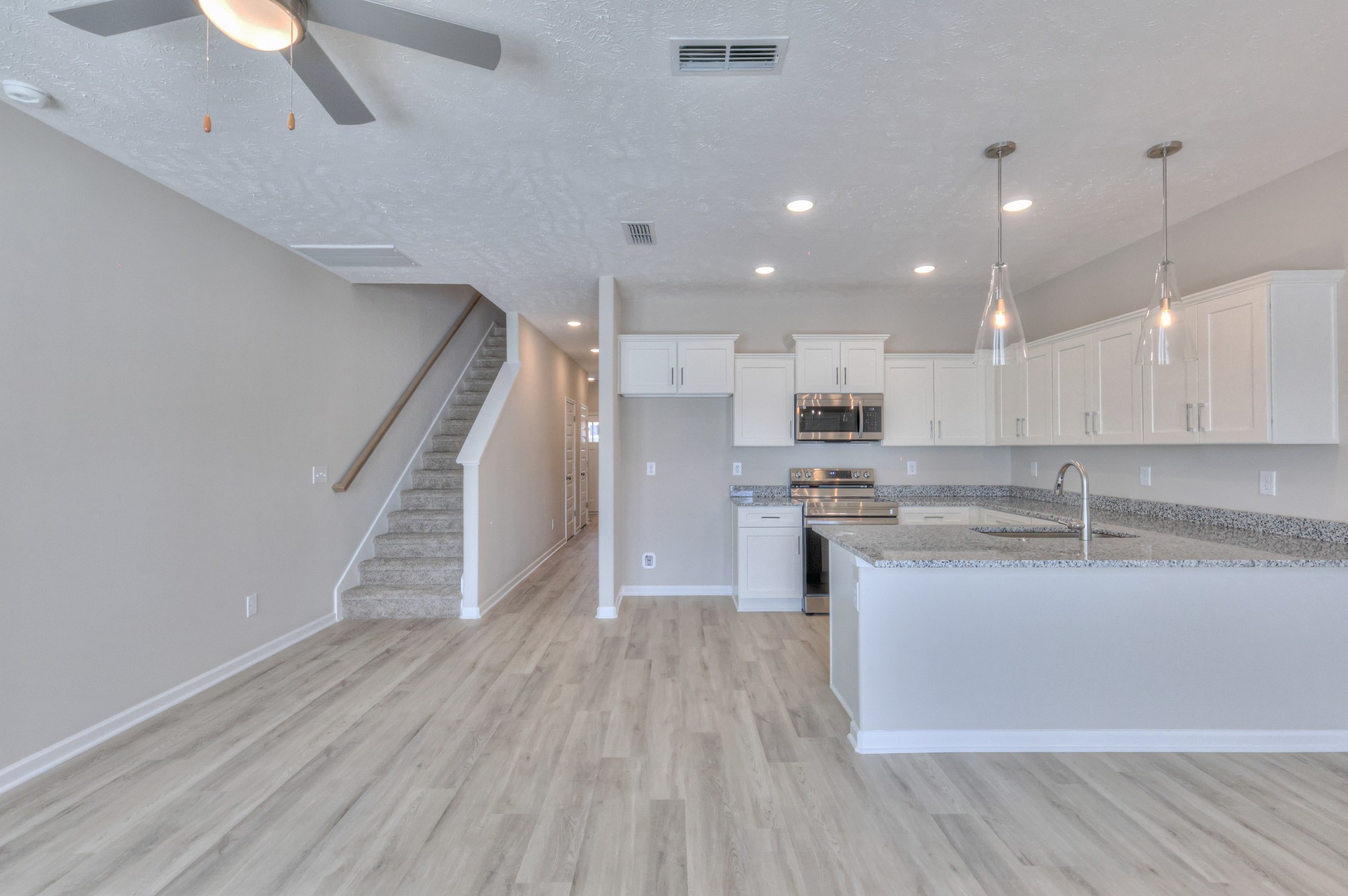 33 Hardwood Road Normandy, TN 37360 - Photo 10 of 28 a view of kitchen with granite countertop stainless steel appliances counter space and wooden floor