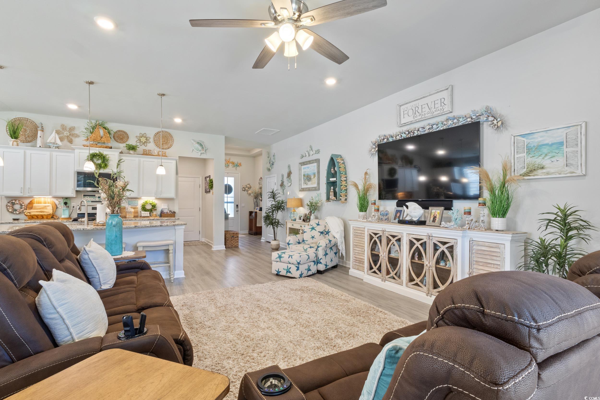 6037 Mcclain Court Little River, SC 29566 - Photo 12 of 39 Living room with light wood-style floors, ceiling fan, and recessed lighting