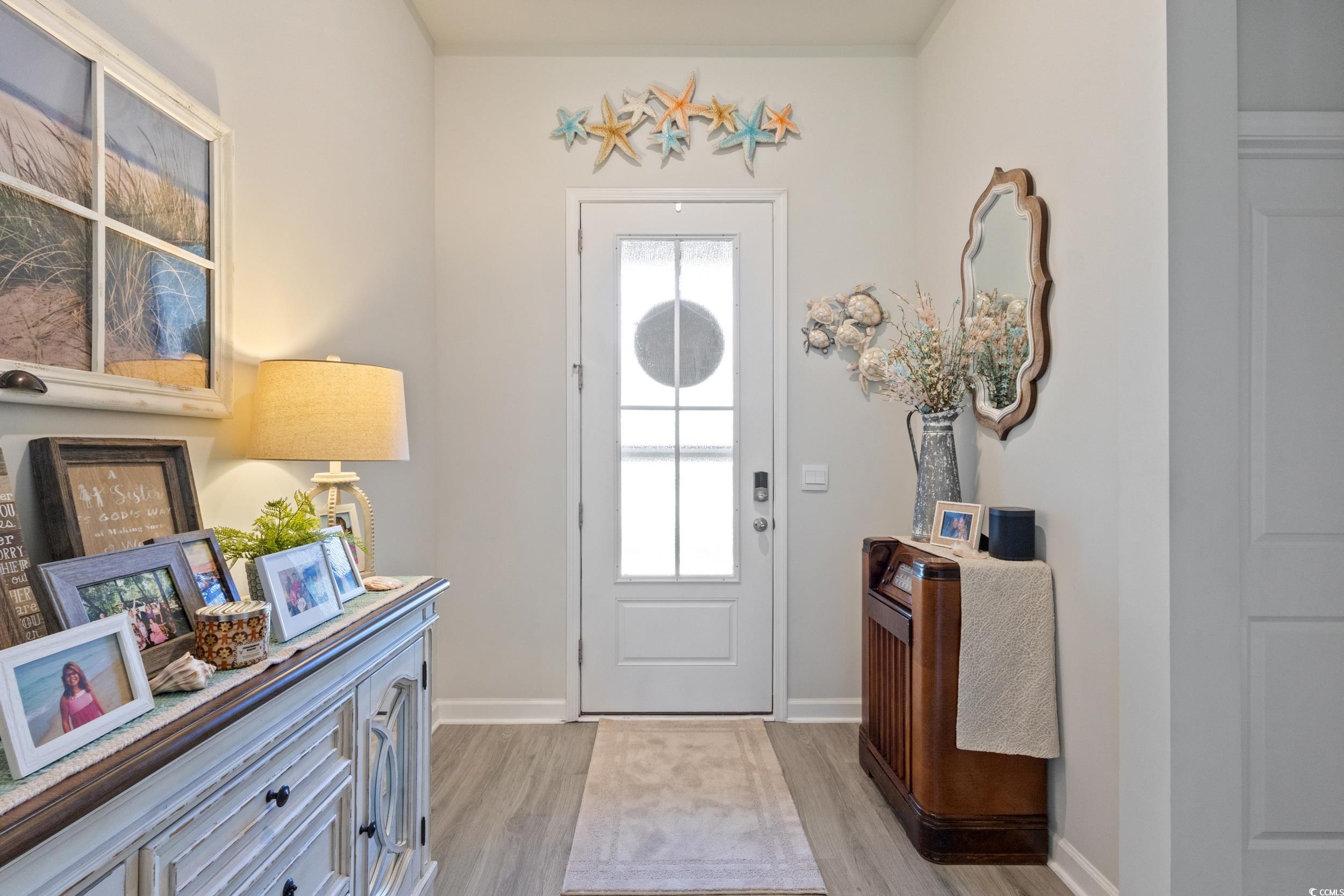 6037 Mcclain Court Little River, SC 29566 - Photo 7 of 39 Entrance foyer with light wood-style floors