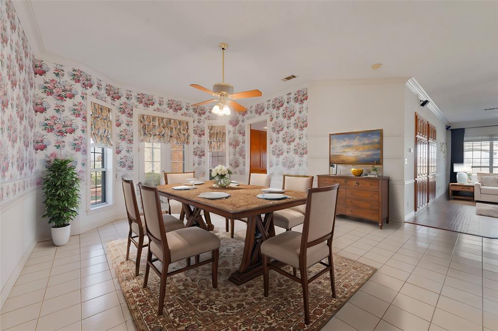 2251 English Road Rockwall, TX 75032 - Photo 11 of 36 a view of a dining room with furniture and chandelier