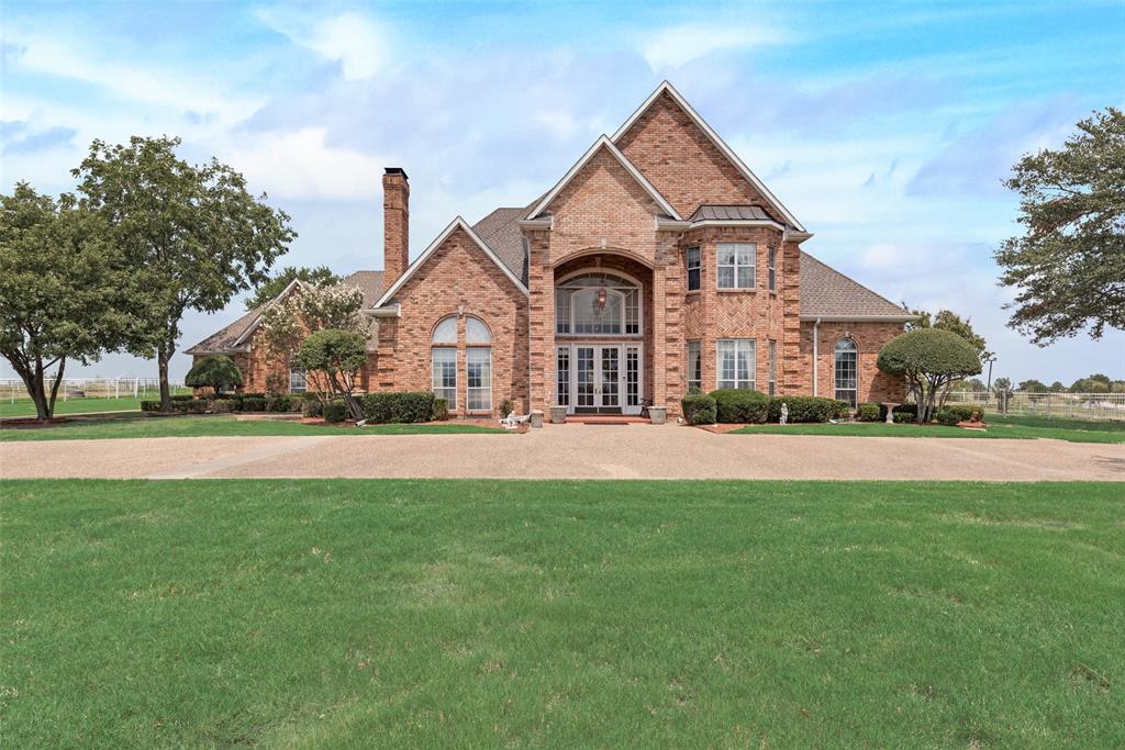 2251 English Road Rockwall, TX 75032 - Photo 4 of 36 a front view of a house with a yard