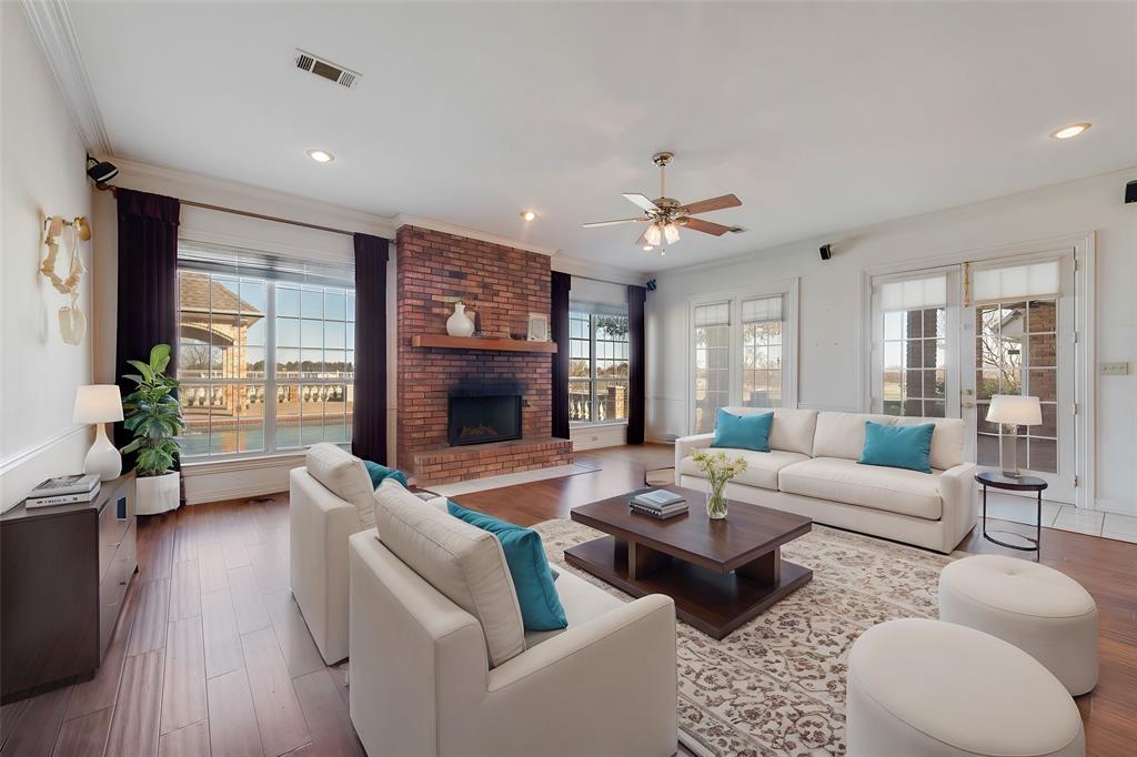 2251 English Road Rockwall, TX 75032 - Photo 9 of 36 a living room with furniture and a large window