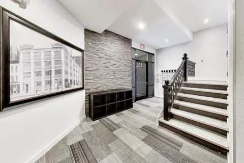 a view of entryway with a front door