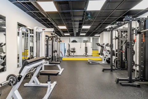 a view of a room with gym equipment