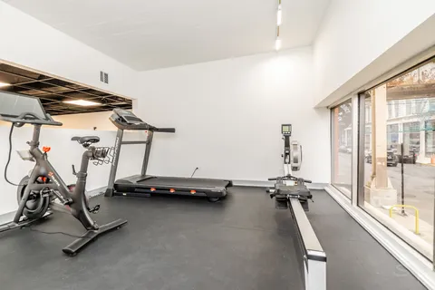 a view of a room with gym equipment