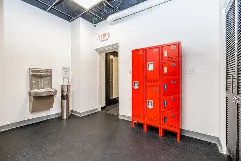 a view of a room with wooden door