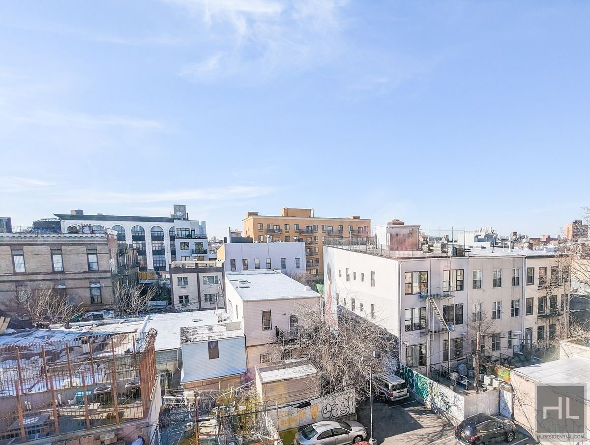 1143 Dekalb Avenue, Unit 4G Brooklyn, NY 11221 - Photo 4 of 7 a view of city with tall buildings