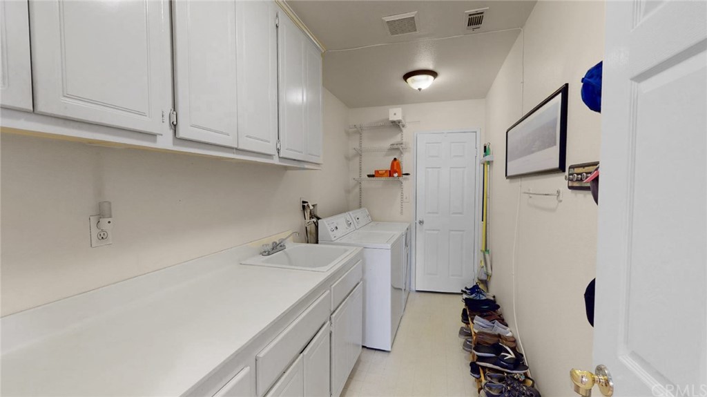 3685 Sedlock Drive Corona, CA 92881 - Photo 14 of 34 a room with sink and cabinets