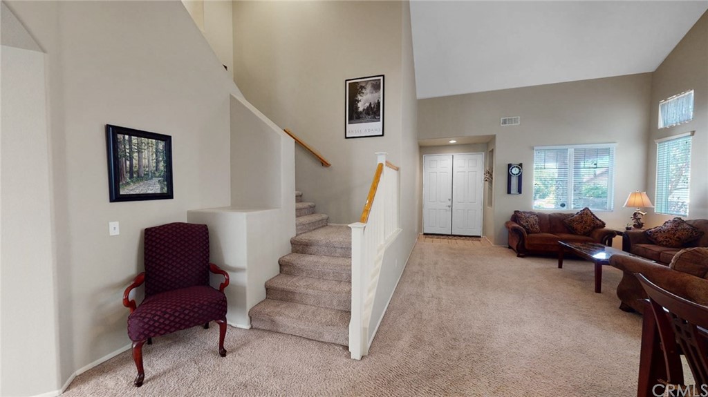 3685 Sedlock Drive Corona, CA 92881 - Photo 15 of 34 a living room with furniture and a chair