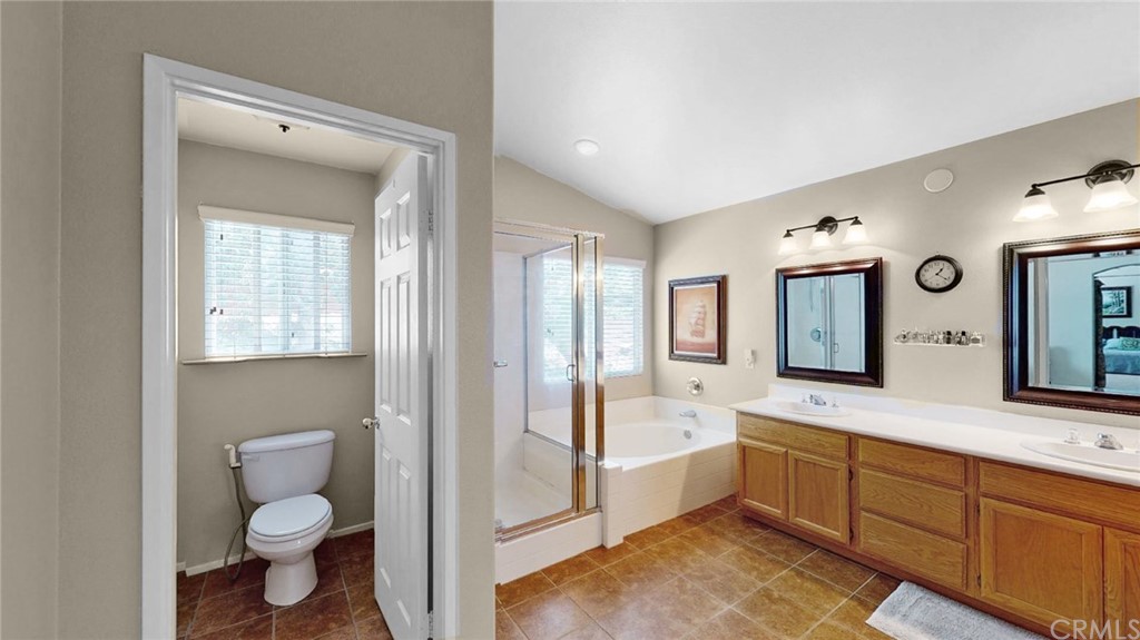 3685 Sedlock Drive Corona, CA 92881 - Photo 21 of 34 a bathroom with a toilet sink and mirror
