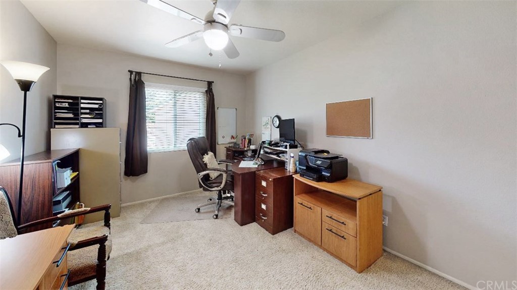 3685 Sedlock Drive Corona, CA 92881 - Photo 23 of 34 a view of a workspace with furniture and a window