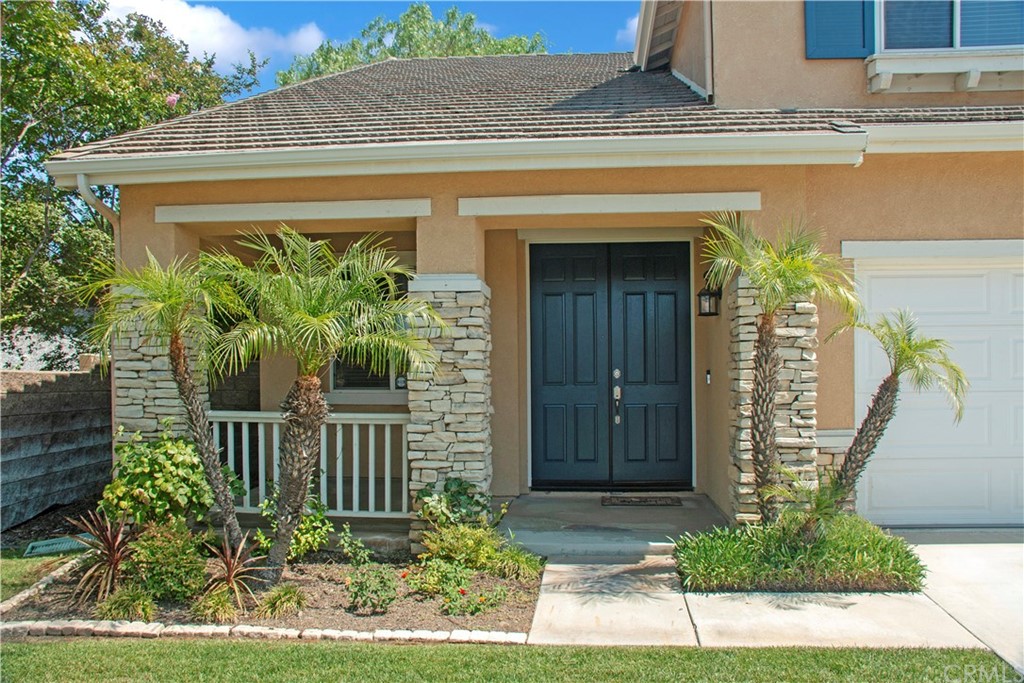 3685 Sedlock Drive Corona, CA 92881 - Photo 3 of 34 a front view of a house with a yard
