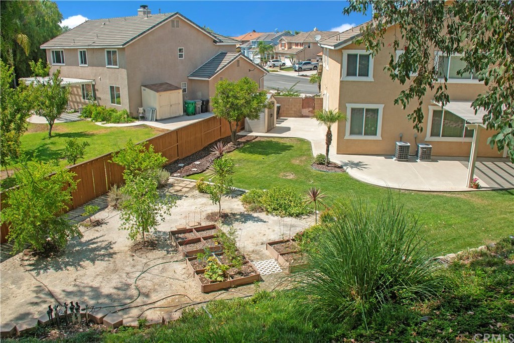 3685 Sedlock Drive Corona, CA 92881 - Photo 32 of 34 a front view of a house with garden