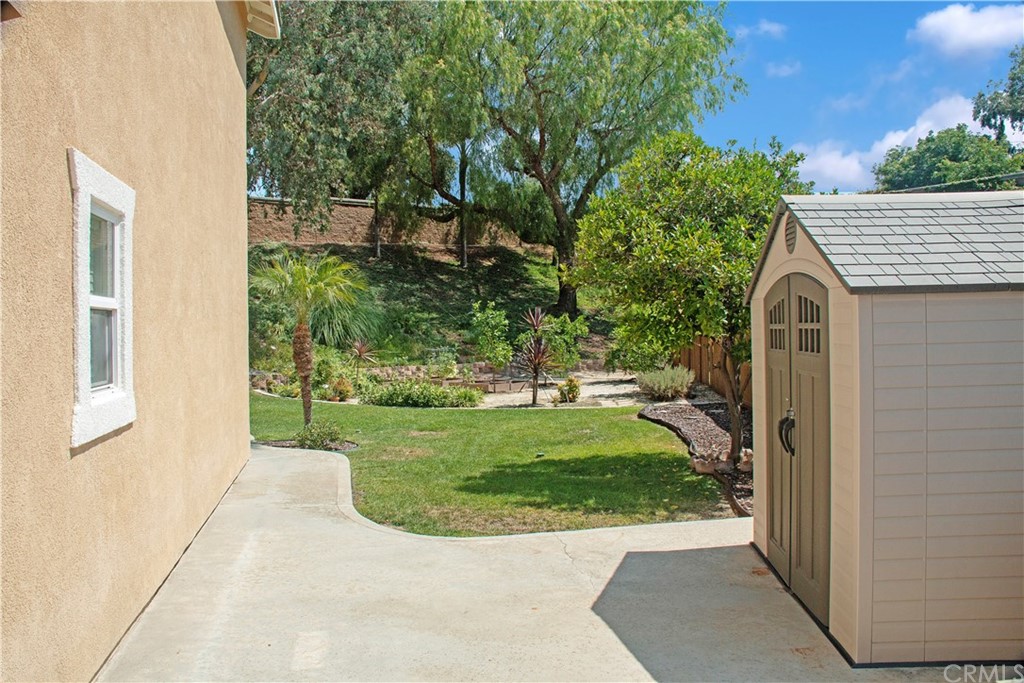 3685 Sedlock Drive Corona, CA 92881 - Photo 34 of 34 a view of a backyard with potted plants