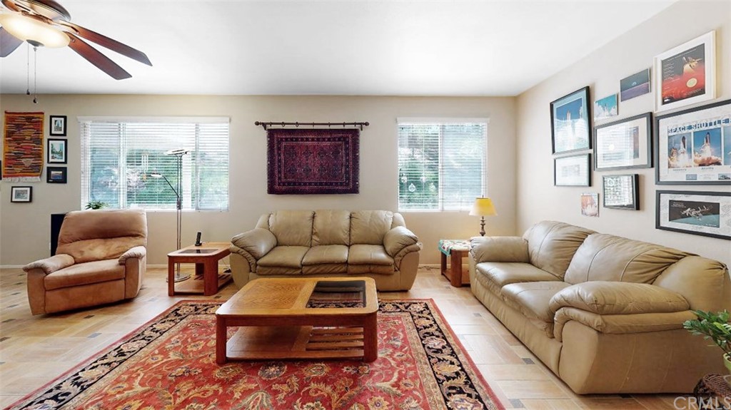 3685 Sedlock Drive Corona, CA 92881 - Photo 8 of 34 a living room with furniture and a large window