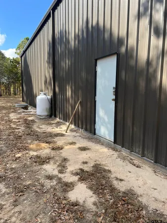 a view of wooden wall with sign board