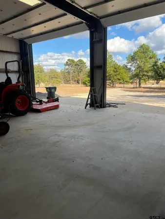 a view of a floor to ceiling window and an empty room