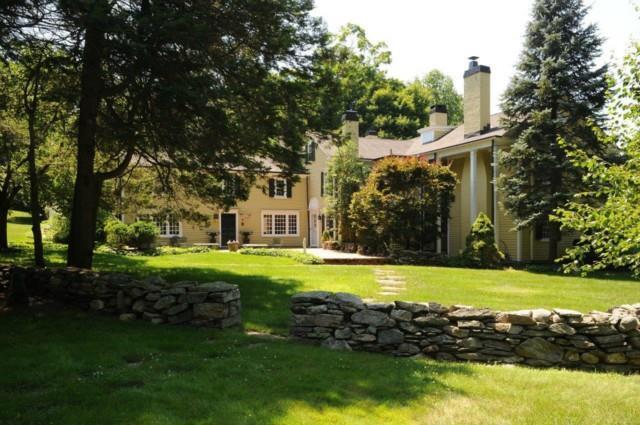109 Cannon Road Wilton, CT 06897 - Photo 1 of 1 a view of a swimming pool and trees in the background