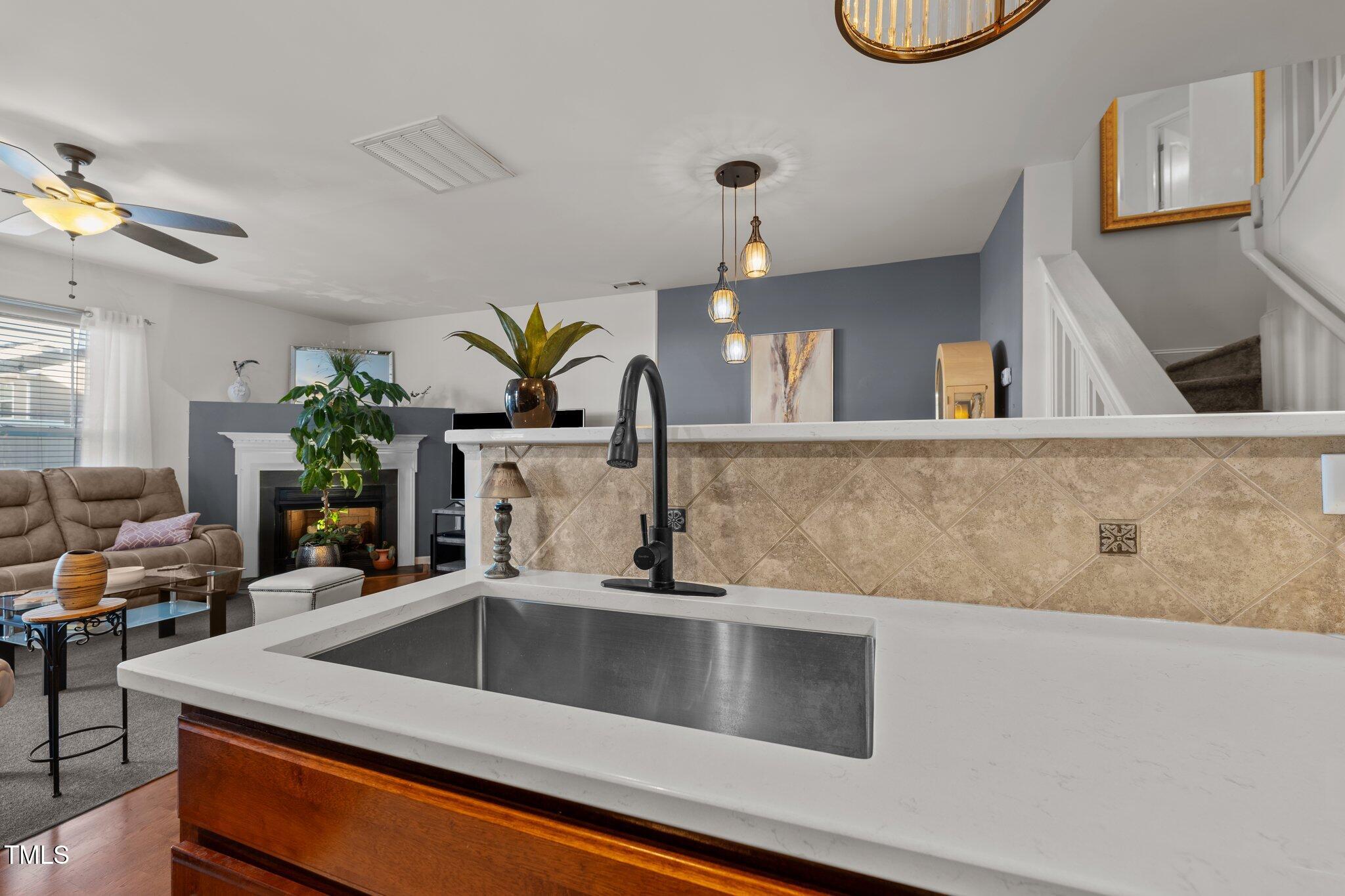 4027 Comrie Lane Burlington, NC 27215 - Photo 18 of 47 a close view of sink and tap