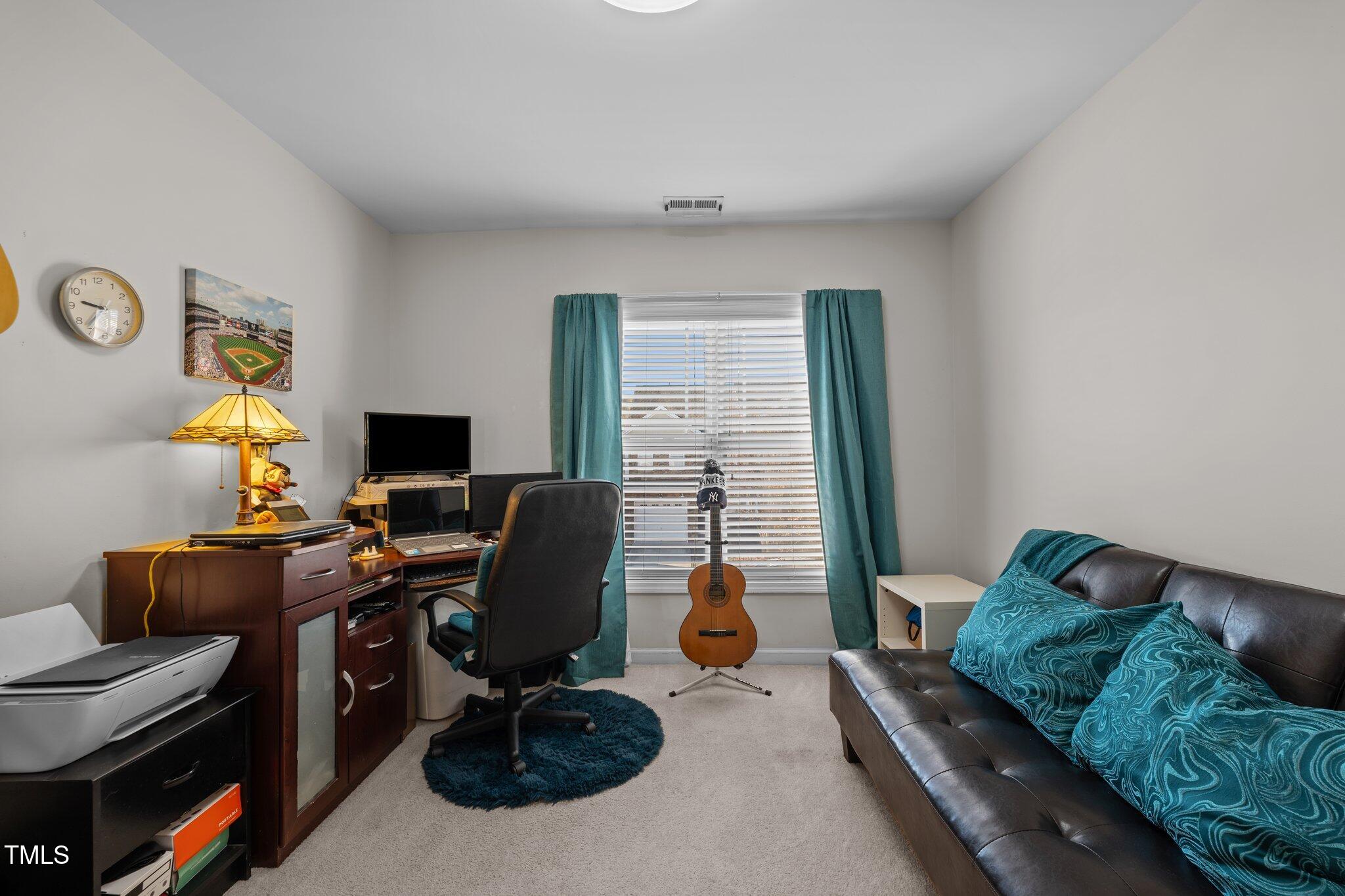 4027 Comrie Lane Burlington, NC 27215 - Photo 33 of 47 a view of a workspace with a window