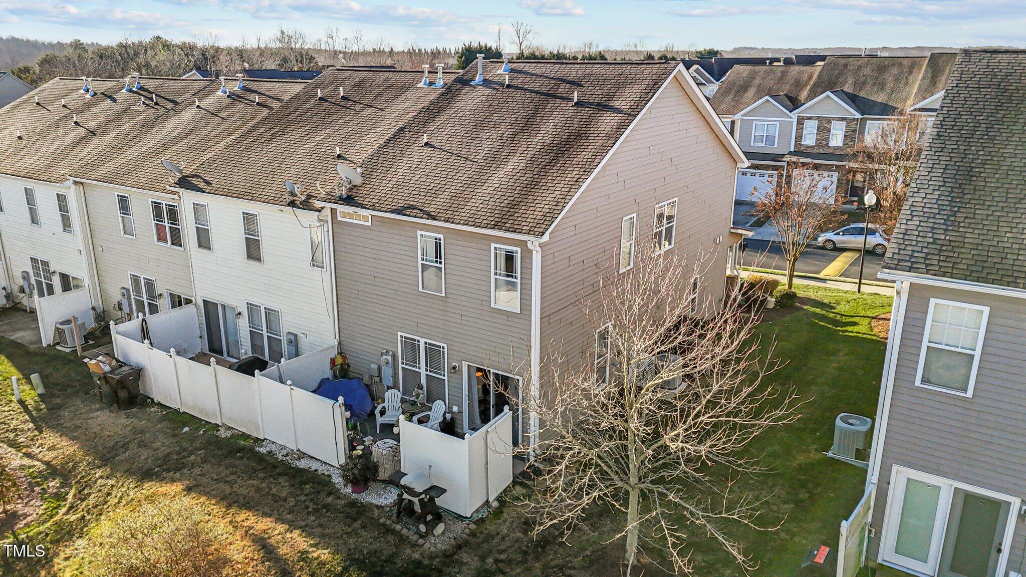 4027 Comrie Lane Burlington, NC 27215 - Photo 36 of 47 a view of a house with backyard and sitting area