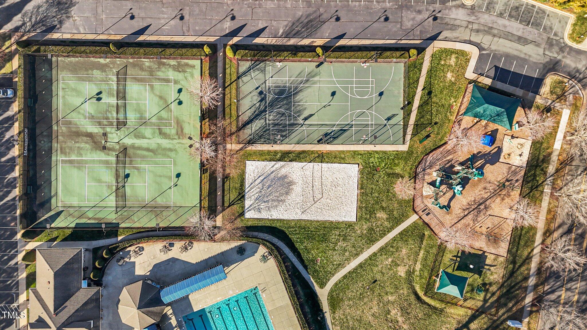 4027 Comrie Lane Burlington, NC 27215 - Photo 42 of 47 a view of walk in closet with clothes and shoes
