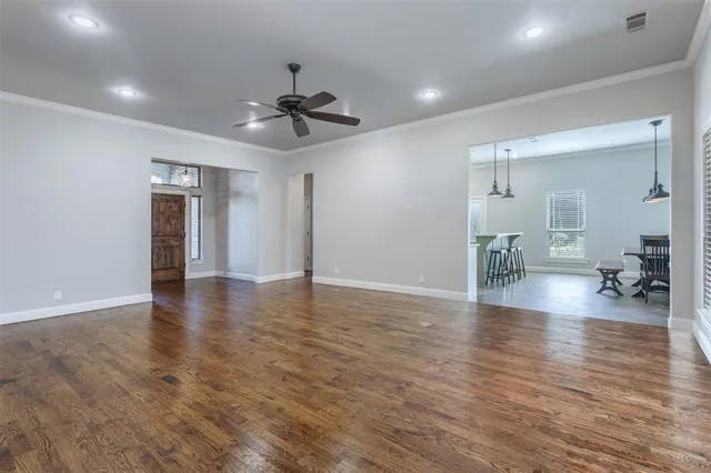 a view of a livingroom with wooden floor