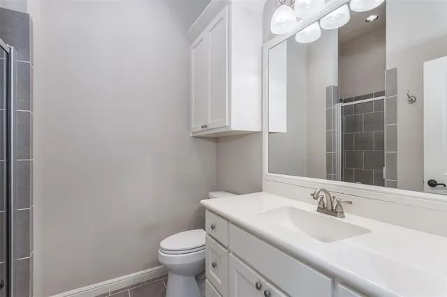 a bathroom with a sink and a toilet