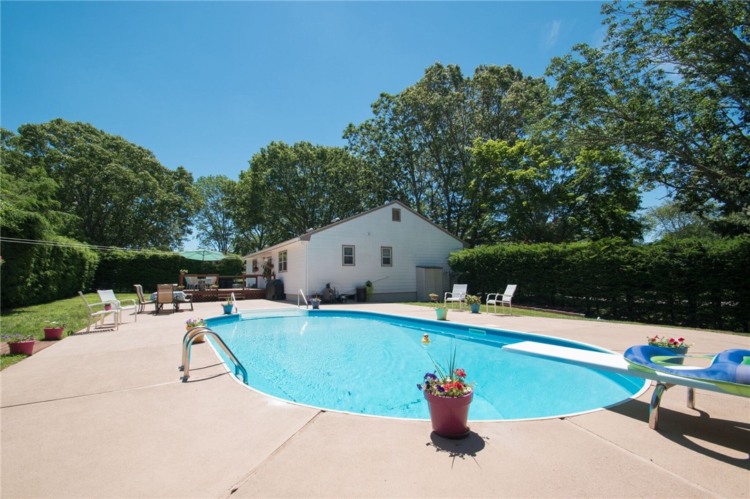 7 Gallup Street Westerly, RI 02891 - Photo 21 of 21 7 Gallup Road in Westerly is a 3 BR, 1.5 Bath Ranch with a deck and swimming pool on the corner of Colonial Drive. Attached 2 car garage, new roof, deck and freshly painted, move in condition!