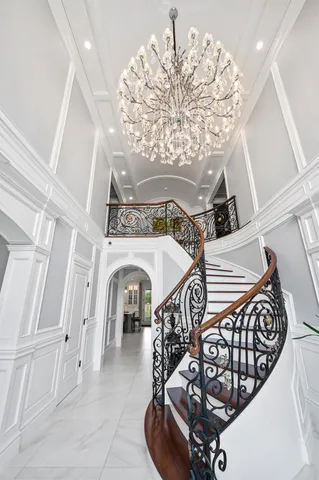 a view of entryway with a chandelier