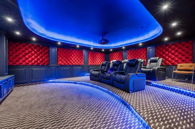 a bathroom with a double vanity sink toilet and shower