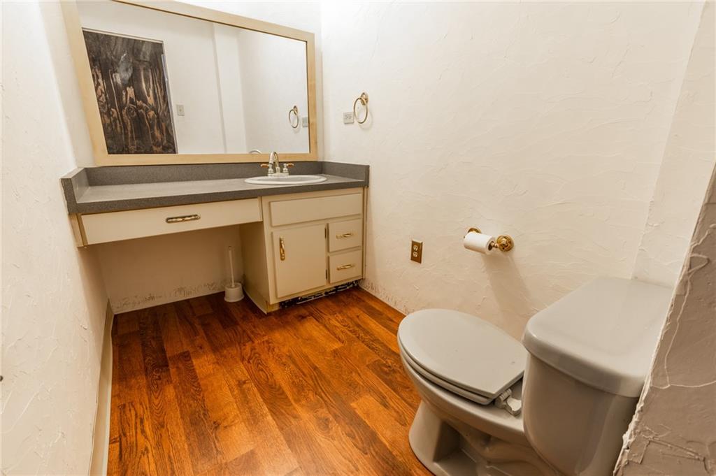3260 Millers Run Road Cecil, PA 15321 - Photo 12 of 22 a bathroom with a sink and a mirror