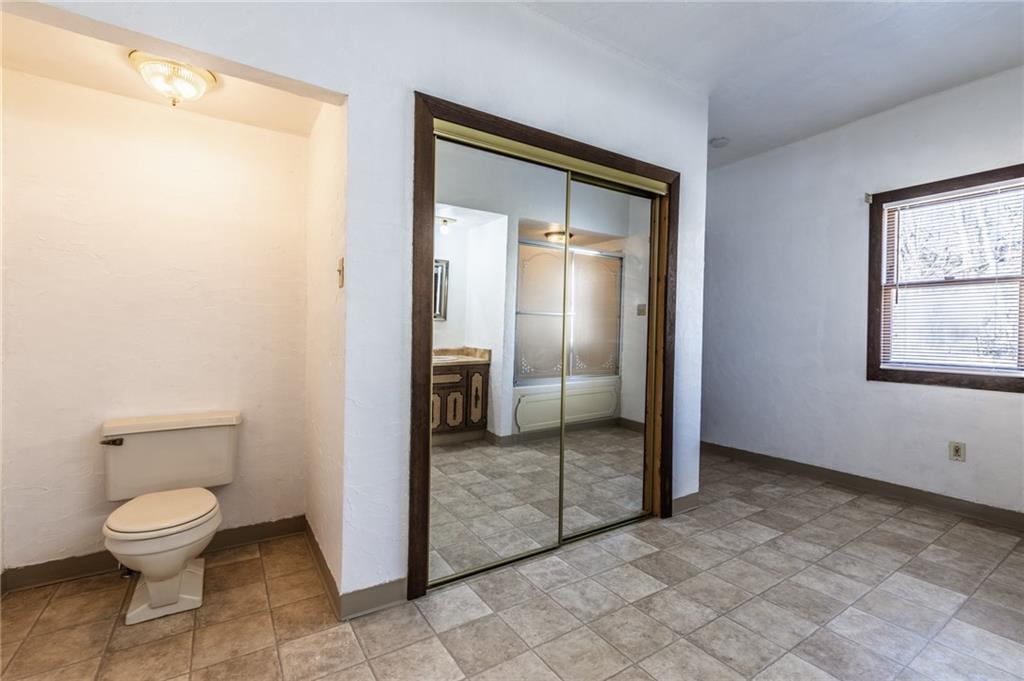 3260 Millers Run Road Cecil, PA 15321 - Photo 14 of 22 a bathroom with a toilet and a shower