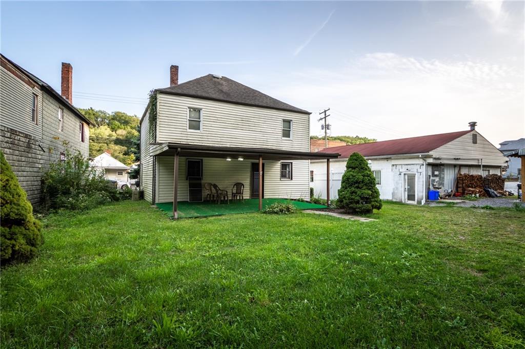 3260 Millers Run Road Cecil, PA 15321 - Photo 19 of 22 a front view of a house with a garden