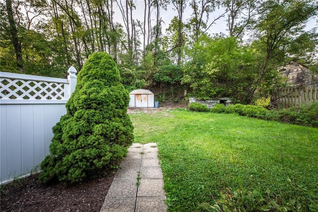 3260 Millers Run Road Cecil, PA 15321 - Photo 22 of 22 a backyard of a house with lots of green space