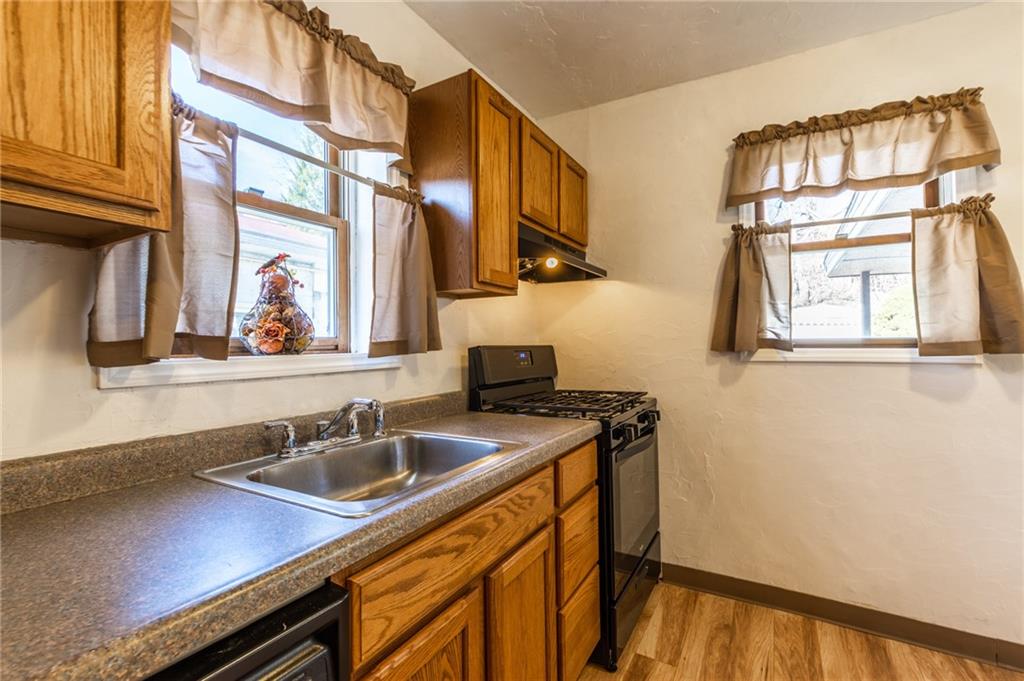 3260 Millers Run Road Cecil, PA 15321 - Photo 4 of 22 a kitchen with a sink cabinets and a window