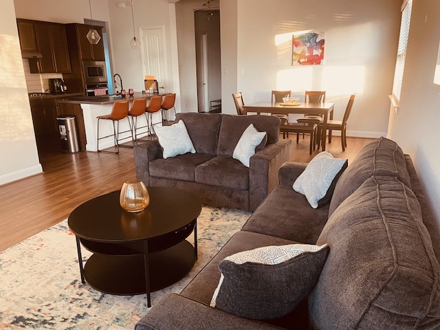 1925 Waterfall Avenue Leander, TX 78641 - Photo 2 of 17 a living room with furniture and wooden floor