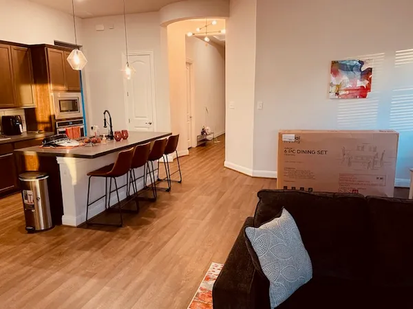 a spacious bathroom with a double vanity sink and a mirror