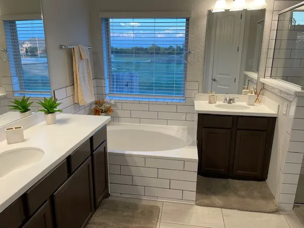 a bathroom with a sink and a bathtub