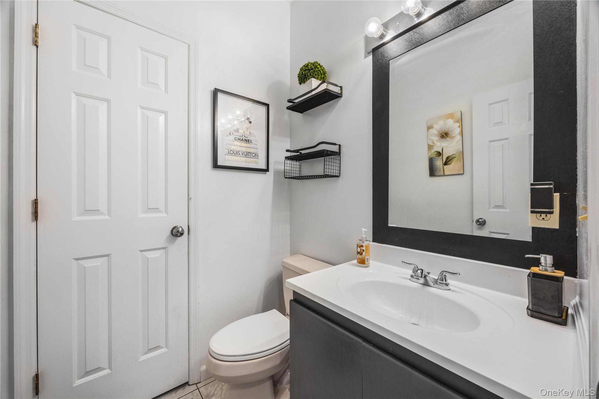 3 Miller Road Putnam Valley, NY 10579 - Photo 18 of 48 White vanity with an integrated sink and chrome faucet