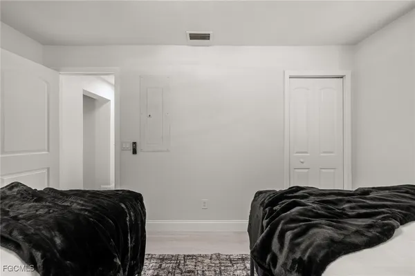 a bathroom with a toilet a sink and shower