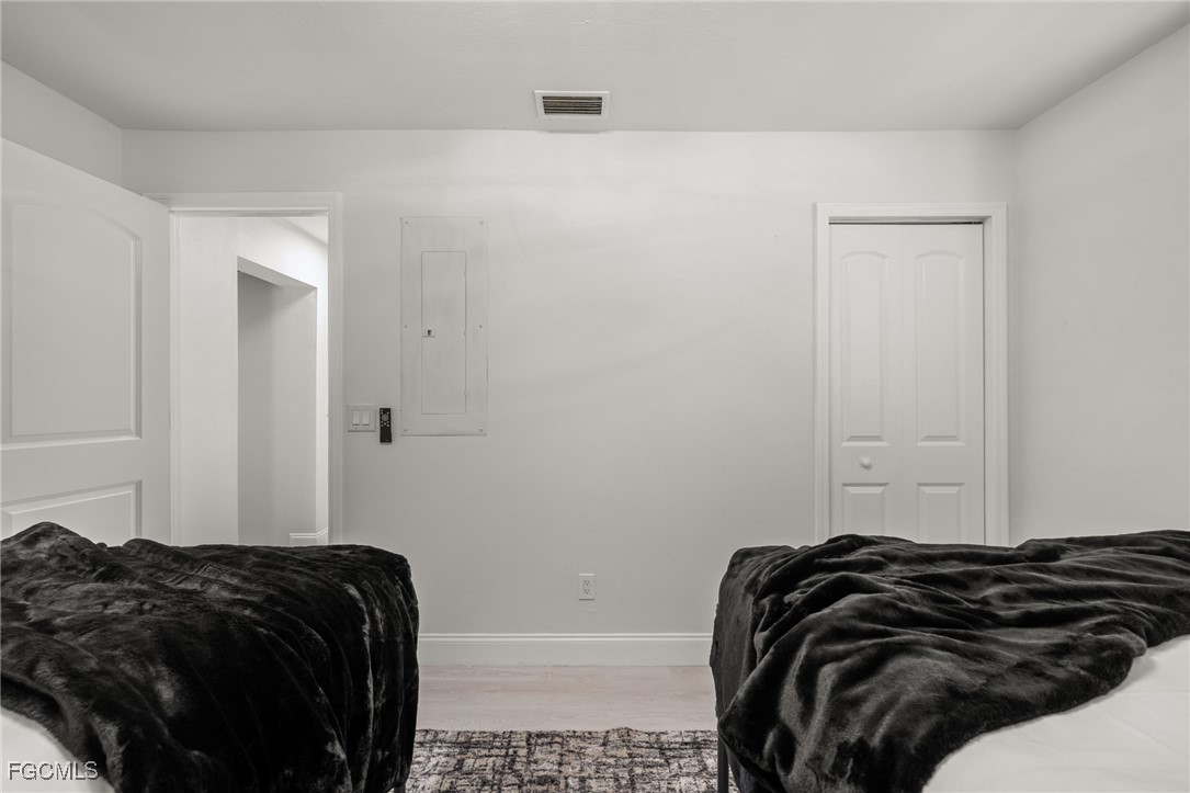 17780-800 Caloosa Road Alva, FL 33920 - Photo 38 of 42 a bedroom with a bed and a window