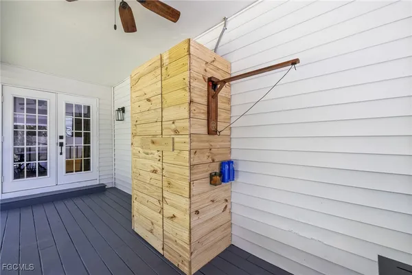 a view of entryway with wooden floors