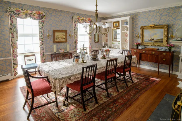 a view of a dining room with furniture window and outside view