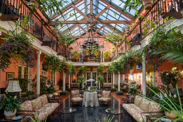 a view of a cafe with sitting area