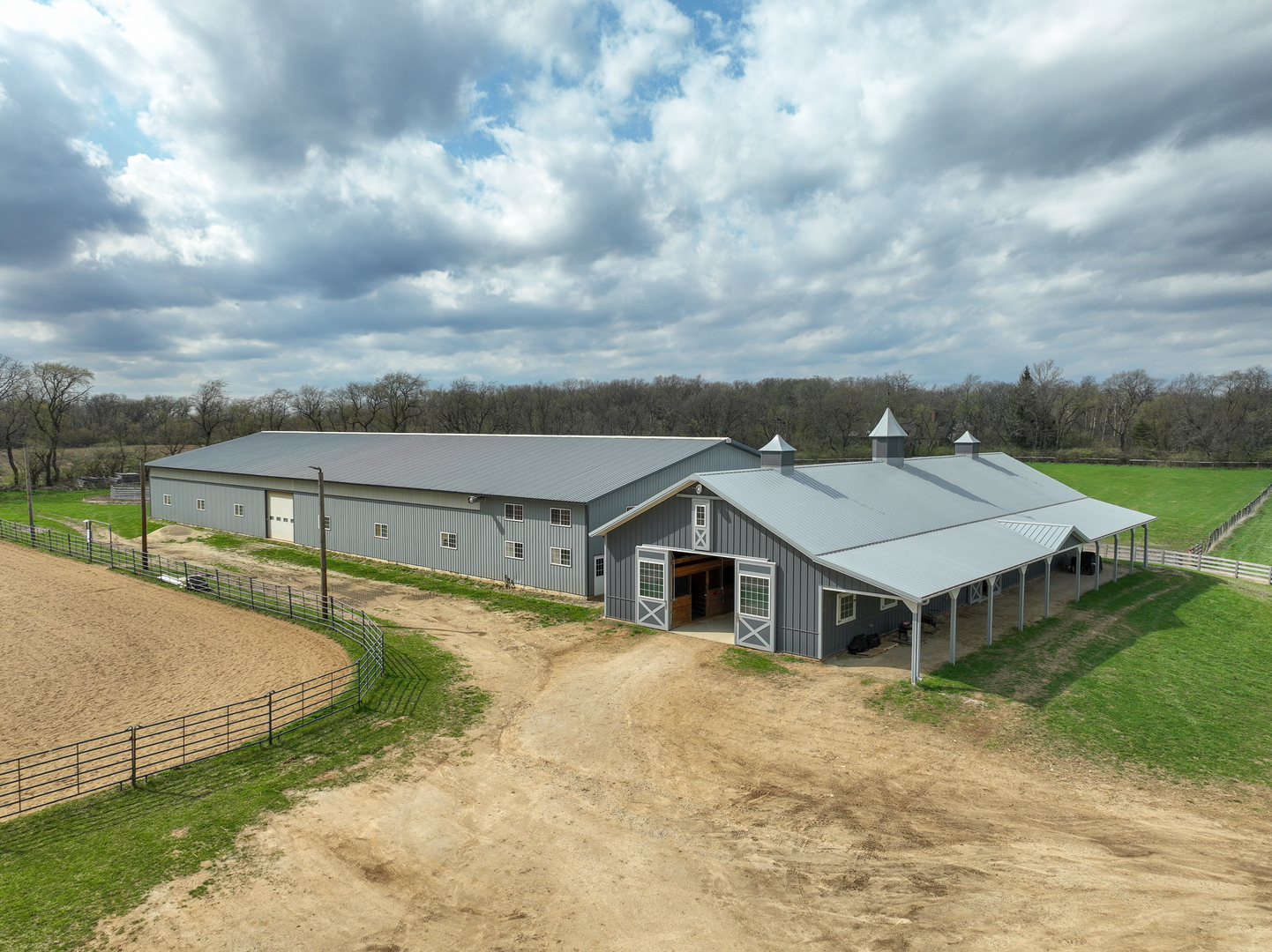 8206 Bull Valley Road Bull Valley, IL 60098 - Photo 11 of 56 a view of a house with a big yard and large tree