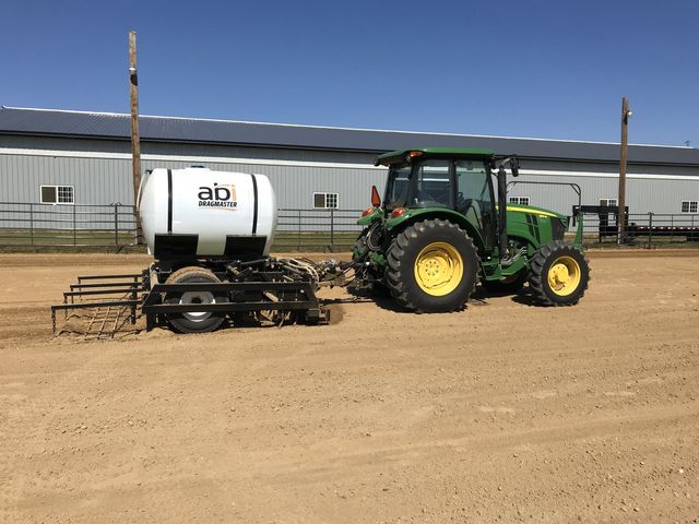 a view of a balcony with chairs and wooden floor