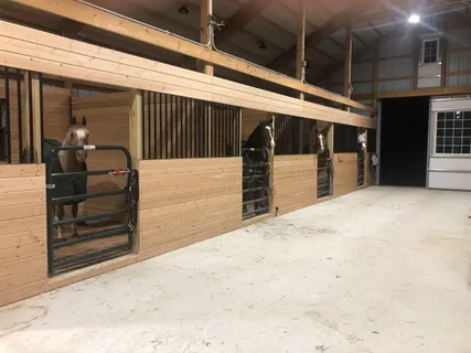 a stove top oven sitting inside of a kitchen and granite counter tops