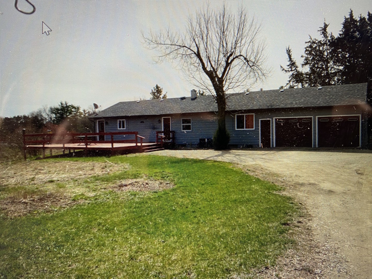 8206 Bull Valley Road Bull Valley, IL 60098 - Photo 50 of 56 a front view of a house with a yard table and chairs